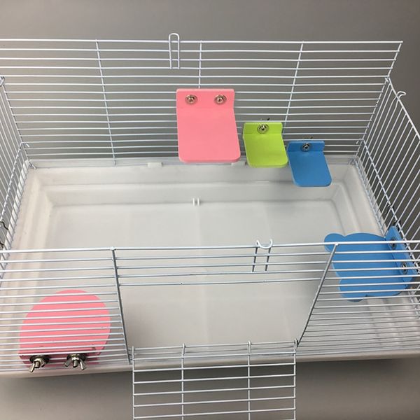 Piattaforma di criceto in plastica Piattaforma per piccoli animali da uccello Piattaforma di perforazione Accessori per giocattoli per la gabbia per la cavia di coniglio