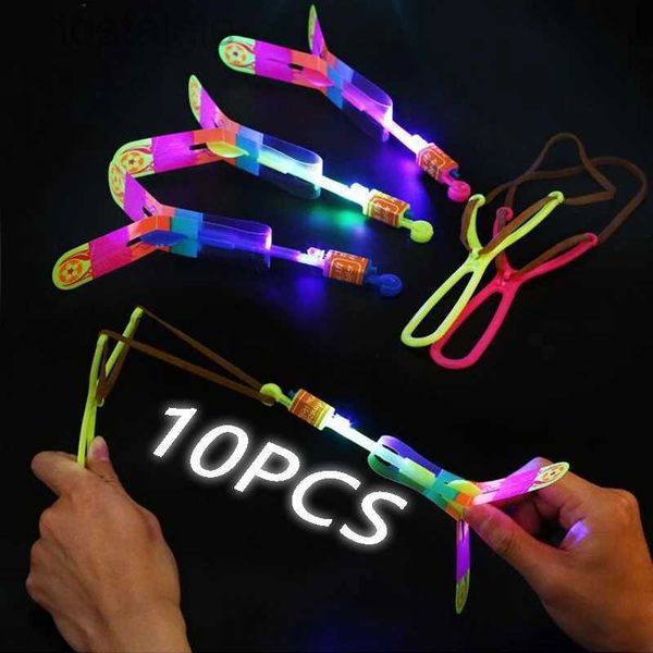 Giocattoli volanti a LED 3-5-7-10 anni giocattoli divertenti volanti a led giocattolo leggero per bambini per adulti elicotteri elicotteri volanti blu/flash Light Light Band Band Catapult 240410