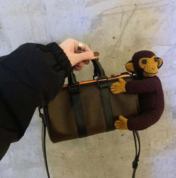 Lüks bayanlar havyar hobo debriyaj cüzdan tasarımcısı kadınlar ile maymun peluş bebek dekorasyon omuz çantası yeni deri çanta çantası moda yüksek kaliteli çapraz bags