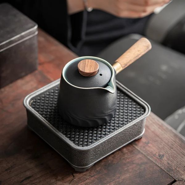 Manico del lato della ceramica nera Tele Teiera Manico in ebano semplice filtro per la casa moderna moderna set da tè in ceramica singola in ceramica