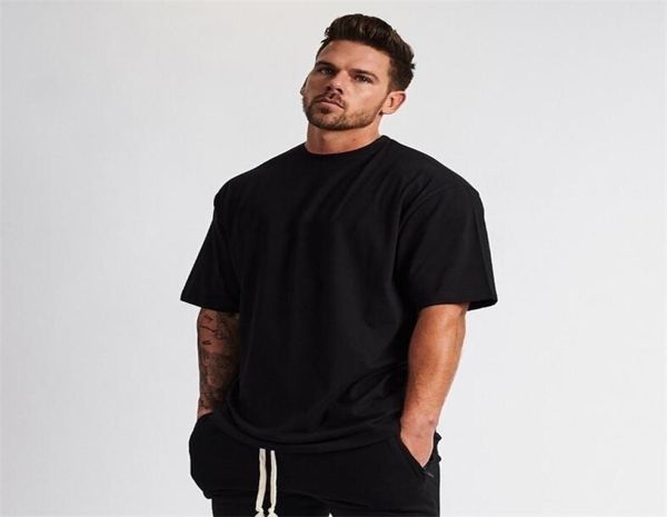 Plain Gym Clothing Fitness Wear camiseta de tamanho grande homem Hip Hop Sportswear Loose Manga curta Tshirt Muscle Bodybuilding Tshirt 2103205967