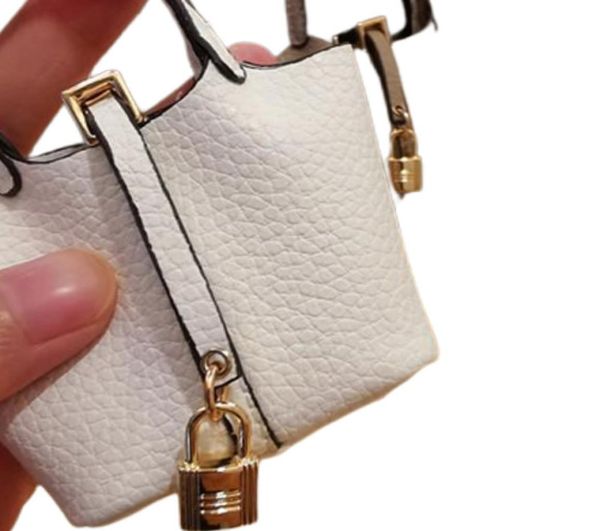 Madeni para çantası AirPods Case mini çanta aksesuarları Lady dekorasyonları için el çantası hediyelik hediye koruyucu çanta çocuklar çanta anahtar zinciri K2527936