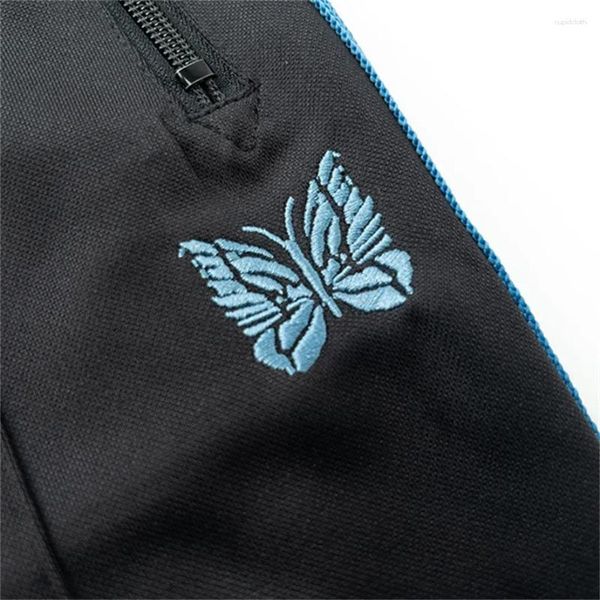 Calça masculina malha listras azuis agulhas homens rastrear borboleta bordado logotipo de calça hip hop
