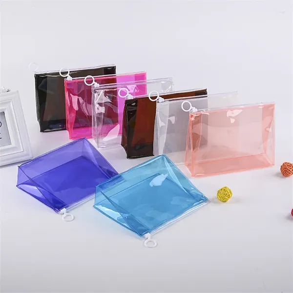 Aufbewahrungstaschen 100pcs/Los transparentes PVC Reißverschlussbeutel Kunststoff Kosmetischer Schüler Schreibwaschwäsche 20x5x15cm