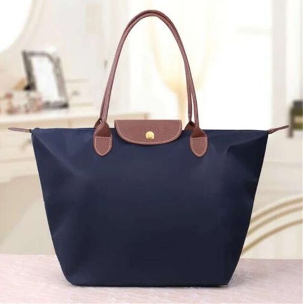 Bolsas de luxo para a noite, a bolsa de bolsas de bolsas famosas designers de nylon de nylon à prova d'água bolsas de compras cruzadas bolsas de ombro cruzadas bolsas de bolinhos dobráveis portáteis