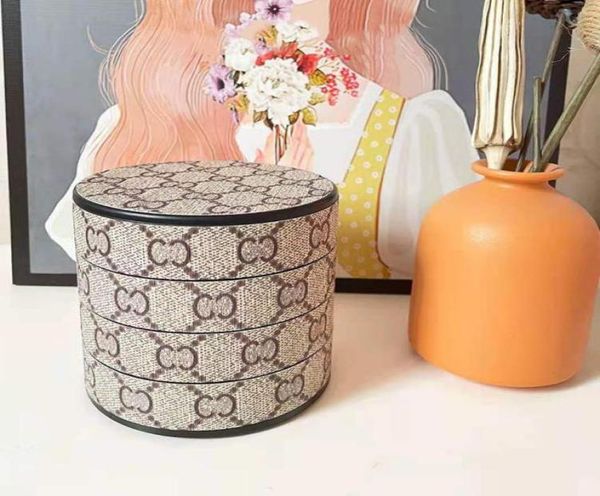 Luxurys Designer Jewelry Storage Box Women Boly Boxes pequenas e requintadas 360 graus Caixa de armazenamento de quatro camadas com espelho GLETT7363493