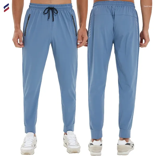 Pantaloni maschili all'ingrosso in poliestere casual poliestere con logo stampato personalizzato Jogger che gestisce palestra elastica elastica pantaloni per i pantaloni della tuta per uomo C657