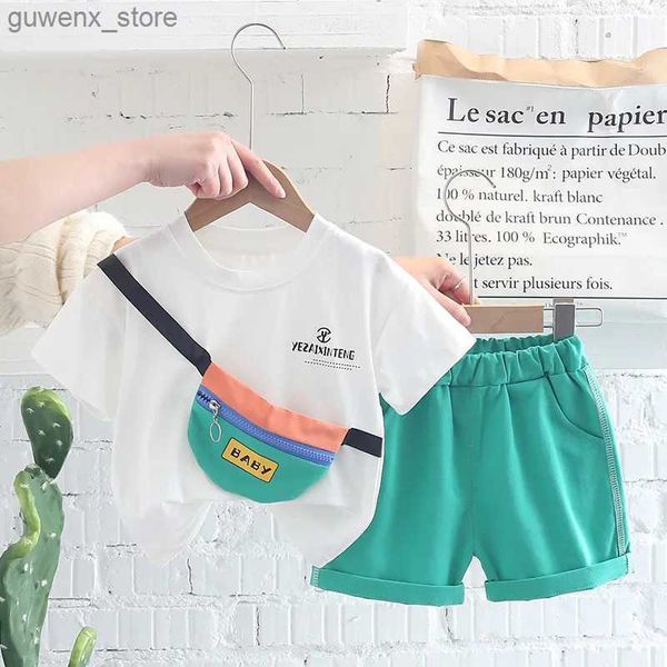 Roupas Define novos meninos meninas meninas roupas de verão Tiras de algodão esportes camiseta infantil shorts com bolsa de roupas infantis de pistas de roupas de 0-4 ano Y240412