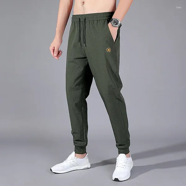 Pantaloni maschili eleganti moda harajuku slim fit ropa hombre tutti sudore su un sudore tasche sciolte di pantaloni della tuta casual leggings cilindri dritti casual