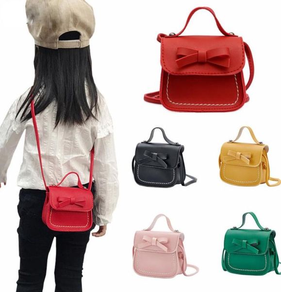 2020 Little Girl Coin Geldbörse Handtasche Brieftasche kleine Coin Box -Tasche Süßes Bogenkind Geldbeutel Baby Schulterbalken Bolso8198003