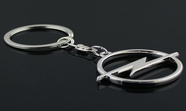 5pcslot Fashion Metal 3D Auto Logo Torta Keychain Keyring Ring Ring Chaveiro Llavero per Opel Auto Accessori per auto a ciondolo auto whol5651753