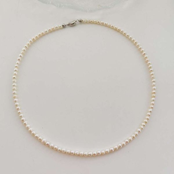 Collana perle in acqua dolce naturale per donne S925 Fibbia per tesori in dollari d'argento 2024 Nuovo collo graffiabile luminoso in polvere di alta qualità