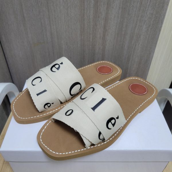 Famosi sandali designer donna donna piatti piatti di mulo da donna vetrini di schiuma piattaforma casa slancia sandel estate scarpe da spiaggia calabroni flip flops zoccoli sandles