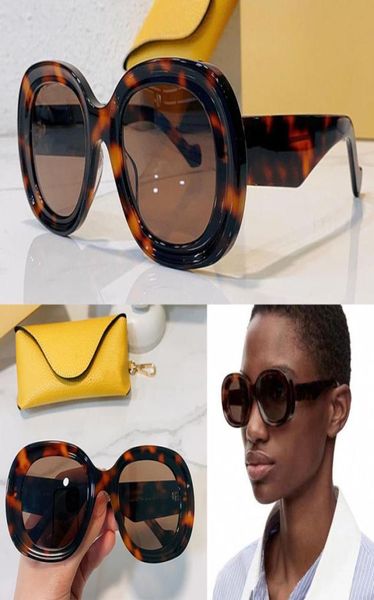 Designer di spagnoli da donna Occhiali da sole 40103 per le donne uomini acetato di forma rotonda occhiali da sole Mens Style Cycling protegge gli occhi UV48875706