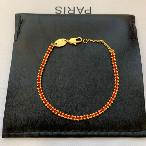 2024 Nueva pulsera de cuerda torcida tejida de la suerte con revestimiento francés caliente Pulseras de oro Brazalete Joyería_voghion.com