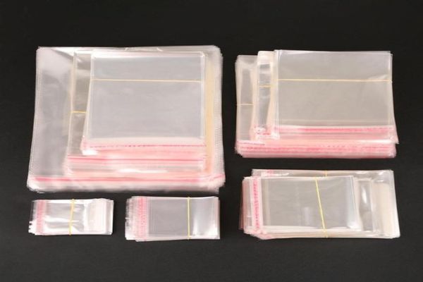 NOVOS CORRIDOS 200PCS Pacote de jóias claras de focas auto -adesivas Sacos plásticos transparentes para sacos de plástico para joalheria261632199