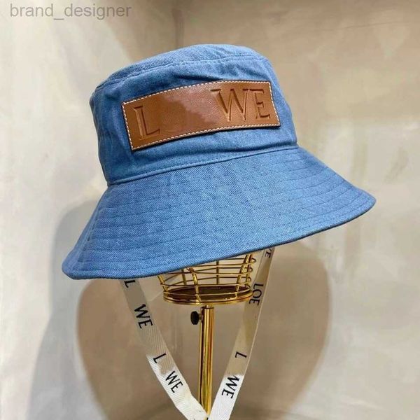 Cappello di design ad alta versione Lowe New Series Summer Ribbon Canvas Cappello Sun Shade Brim Fisherman Star Scesso Blue Mens e Womens Style