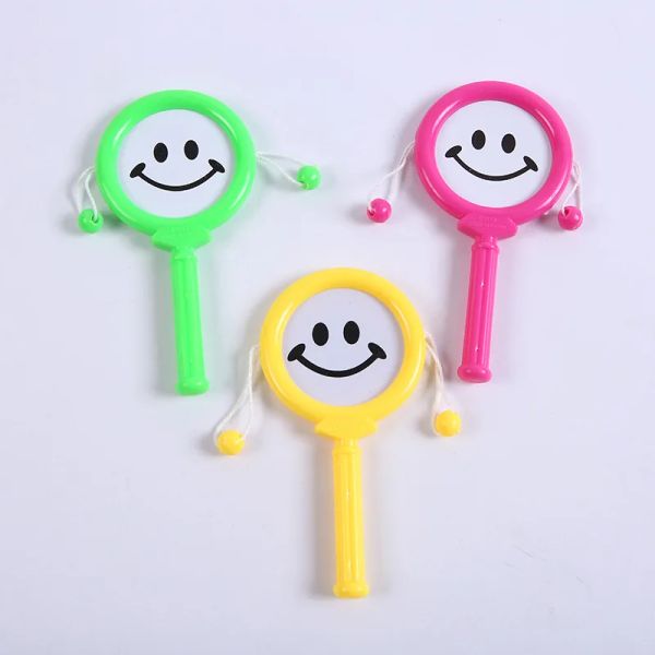 10pcs niedliche Mini Smile Hand Bell Rassel-Drum-Spielzeug für Kinder Geburtstagsfeier Bevorzugt Babyparty Souvenir Goodie Bag Pinata Füllstoff