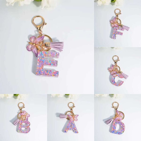 Nuove lettere di nappa A-Z Keetchain Colletful Flower Pieno Iniziali per chiacchiere a farfalla a farfalla Accessori per borse