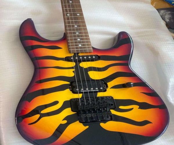 Sonderanfertigte George Lynch Signature Tiger Streifen Sunburst Purple Edge E -Gitarre Ebony Fingerboard Tremolo Bridge9632447
