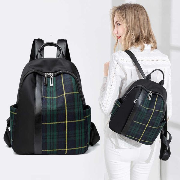 Blockierende Farbe Plaid -Rucksack für Frauen Frühling 2024 Koreanische Version Leicht zu tragen große Kapazität Oxford -Stoff -Reisetasche