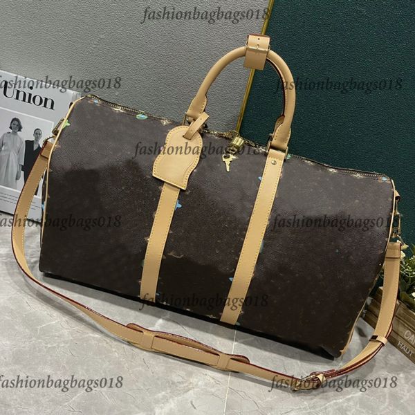 M24901 Explosion Hot Keepall Bandoulier E 50 cm Cabina cioccolato Dimensione doppia chiusura zip Sistema Paradlock Nome Wavy Tag tag colorate Canvas Daisies Terrier