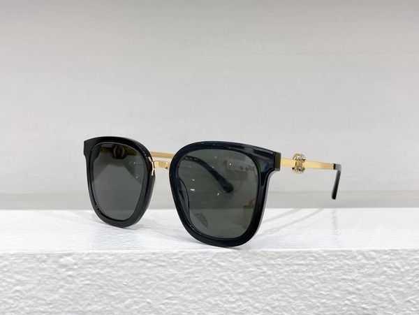 Designerin Sonnenbrille Mu Katzen-Eye Sonnenbrille für Frauen Premium-Buchstaben Sonnenbrille Premium Spiegel Beine grüne Objektiv Sonnenbrille Retro kleiner runder Rahmen sexy kleine Frau