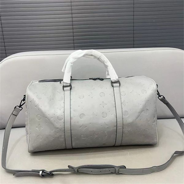 Designer Duffel Bag Reisenbeutel Frauen Handgepäck Duffle Taschen Männer, die echte Lederhandtaschen große Kapazität Sportsäcke mit Schloss prägen