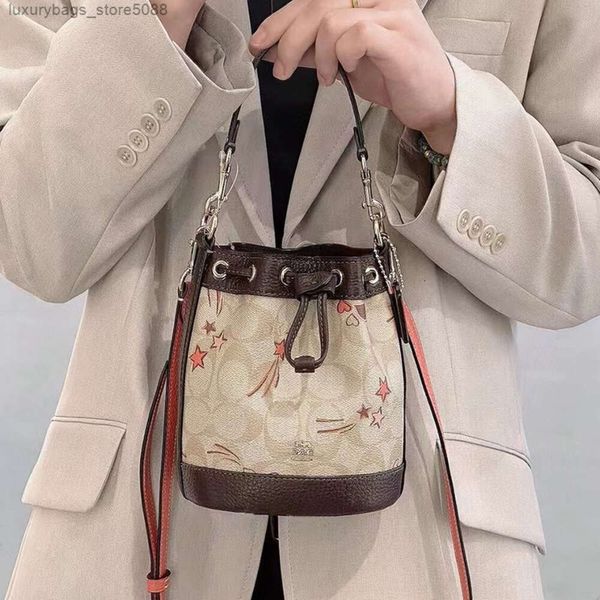 Handtasche Designer 50% Rabatt auf heiße Marke Frauenbeutel New Draw String One Schulterschaufelbeutel