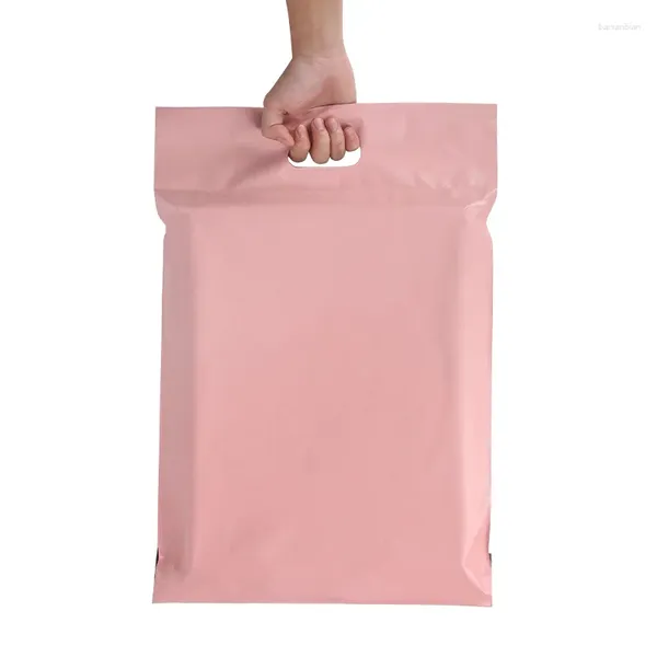 Borse di stoccaggio 50 pezzi/lotto busta di colore rosa Mailing eco-friendly abbigliamento borse di imballaggio espresso sacche di plastica tote