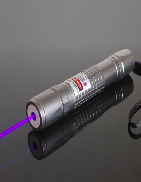 Hochleistungsfokussierbares 405nm UV Laserzeiger Blau violett lila mit 5 Sternenkappen Taschenlampen Torches2184864