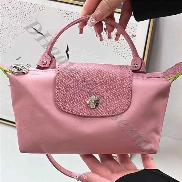 Borsa per borsetta spalla Stume a portata di mano Cambia al dettaglio singolo cambio di vendita all'ingrosso Croce al 95% Versione da Nylon Mobile Mini trasportare Dumpling Womens