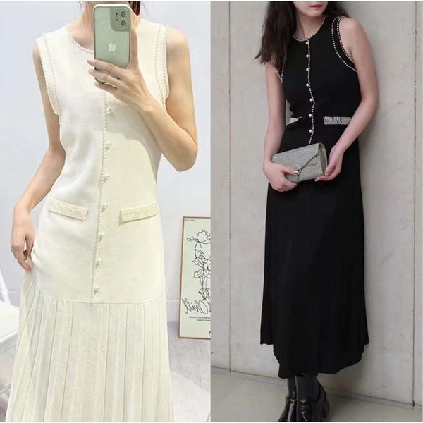 Novos vestidos longos e mangas de malha para mulheres, design de pérolas elegantes e preto de bolso falso de bolso longo fZ2404154