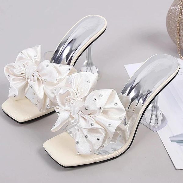 Hausschuhe 2024 Frau sexy PVC transparente Sandalen Mode Crystal Bow High Heels Schuh für Frauenrutschen offene Zehenpumpen schwarz