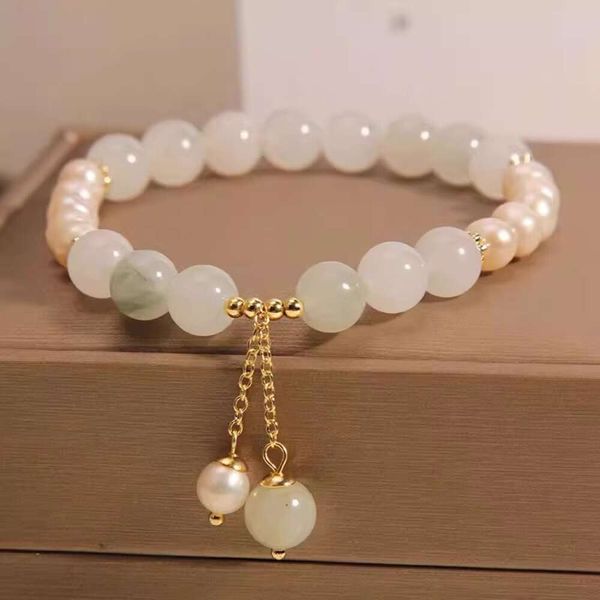 Versão coreana do Instagram do Fengtian Mountain Emerald Crystal Loop Single Loop Women Freshwater White Pearl Tassel Jóias