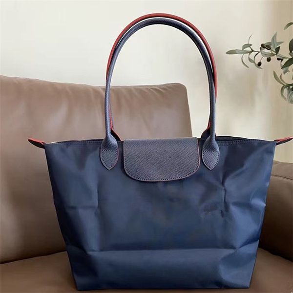 Designer -Tasche Handtasche Damen Großhandel Großhandel Mode Multifunktional großer Kapazität Nylon Vielseitiger Einkaufstasche Laptop Strand Travel Nylon shole Woody Tote