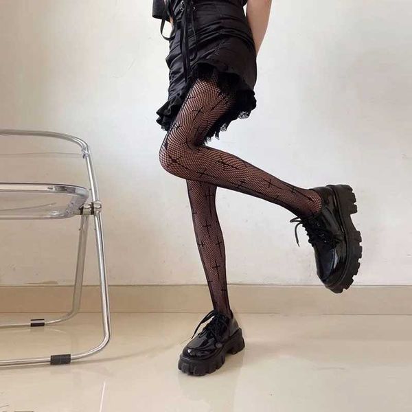 Calzini sexy Donne Sexy Stampa incrociata Spazzine a rete lunghe Nylon High Nylon Socks trasparente calze a cavo out del corpo Black Mesh Pantyhose a rete nera 240416