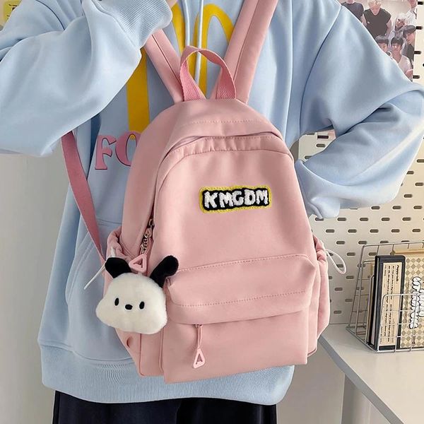 Schulbeutel Mädchen Freizeitschule Briefe rosa Rucksack Schultern Feste Farbe Freizeit Dudelsack weiblich Mochila Bolsa Nylon Verkauf Cartoon