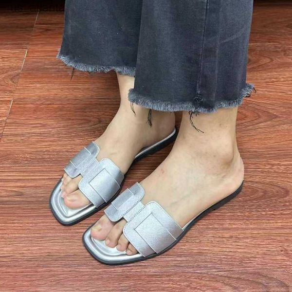 Pantofole tacchi piatti da donna trasparente in PVC Flip-flop 2024 Design alla moda Scarpe estive per donne Slide da donna fuori da donna H240416 NCXX