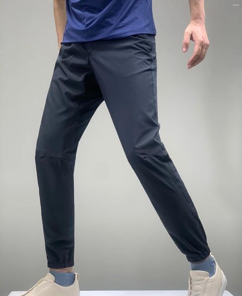 I pantaloni da uomo intrecciano il vento ad alta filo rivestito con tessuto speciale traspirante a secco rapido tricot.