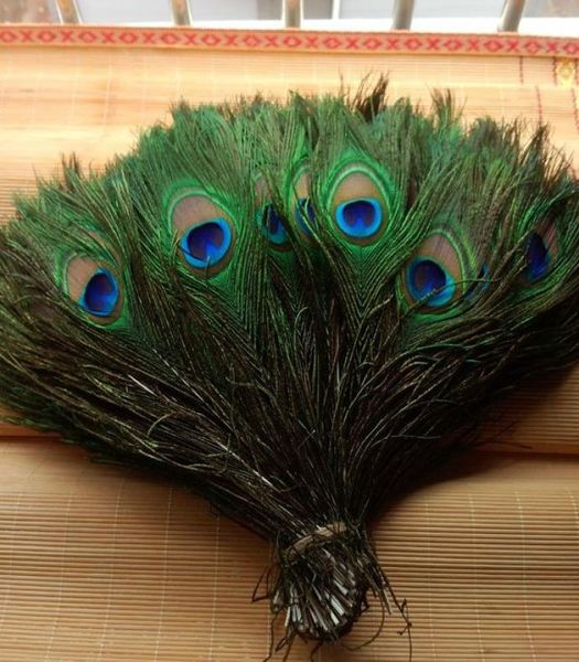 Materiais decorativos elegantes penas de pavão natural reais lindas penas de cerca de 25 a 30 cm HJ1702282540