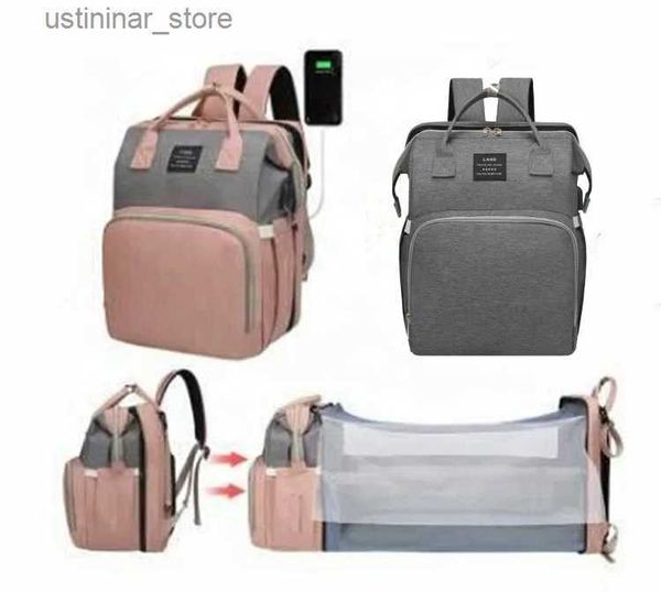 Baby Cribs Hot Sale Multifuncional Multifunction Capacidade Mamãe USB Bolsa com líquido Backpack dobrável Backpack Back com cama de bebê em estoque L416