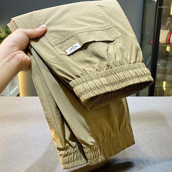 Pantaloni maschili caviglia retrò fasciata marcata di moda corto sciolte sportive pu shuai estate 2024 casual long