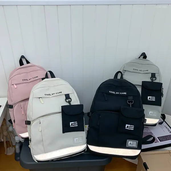 Backpack Feminino Coreano Ferramenta Ferramenta de Estudante College Saco da moda da moda Viagem de casais de casal de homens