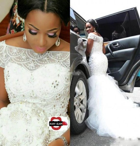 Abiti da sposa nigeriani arabi taglie forti sirena perle di lusso perle perle trasparenti a bateau a maniche corte a maniche corta tulle bridal 8720960