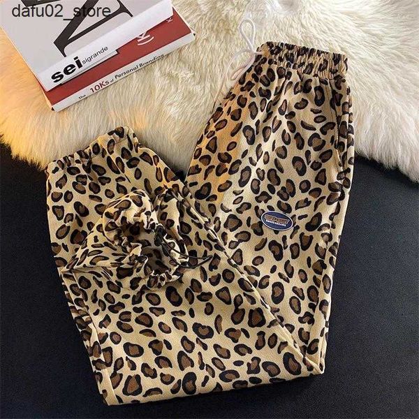 Pantaloni da uomo pantaloni da uomo stampa leopardo vellutoy abiti da uomo abbigliamento giapponese vintage di alta qualità da lavoro di lusso pantaloni per pantaloni della tuta 2024 Q240417