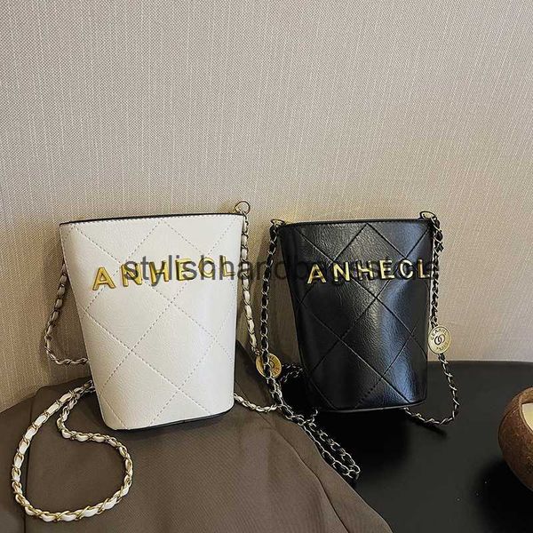 Abendtaschen Neue High-End Koreanische Version Crossbody Small Bucket Bag Nischendesigner Handheld Kette Single Schulter Handy H240417