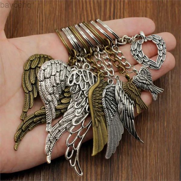 Chaços de teclados Hot Sale Hot Sale New Angel Wing Keychain Carchain Wing Pingentents Chain Chain for Car Metal Pinging Bag fofo charme presente de made handmade d240417