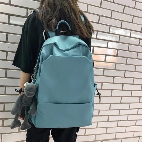 Sırt çantası kurbağa oyuncak katı basit seyahat kalitesi kumaş sırt çantası okul için 2024 Tasarım Büyük Çanta Kadınlar