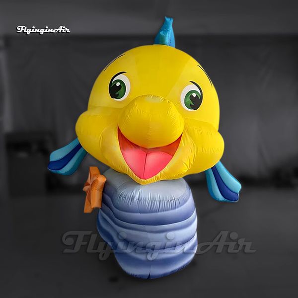 Modella animale da cartone animato carino grande palloncino di pesce gonfiabile giallo con una grande replica di barriera per la decorazione del parco